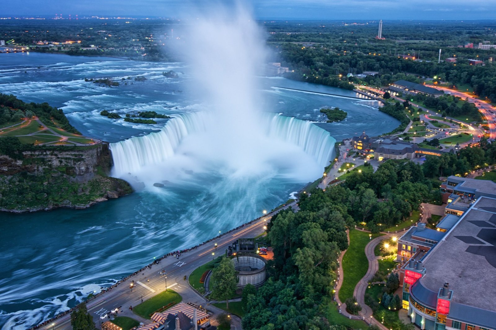 Picture collage of pics from rocky mountains, niagara falls, CN tower